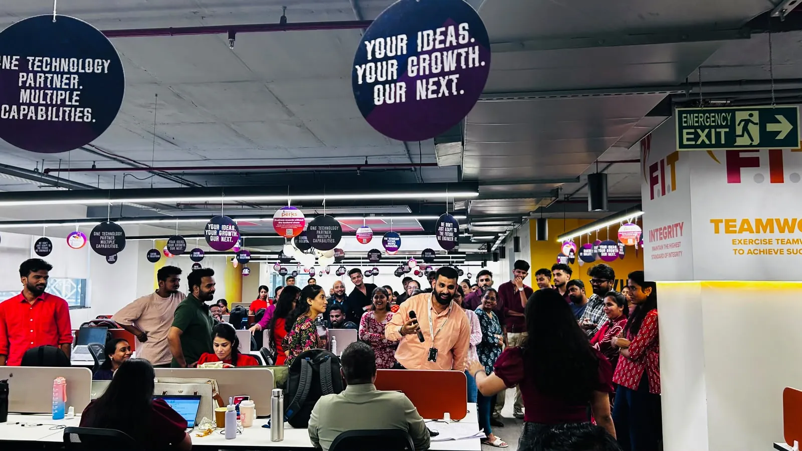 Interactive Q&A on posture and workplace ergonomics on the Quess Corp office floor