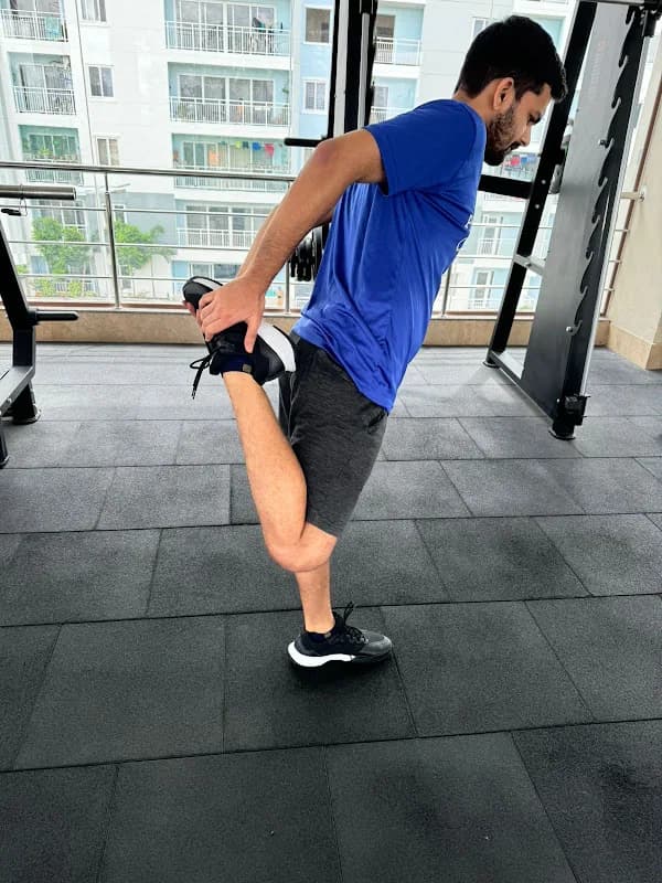Patient doing a guided quadriceps stretch