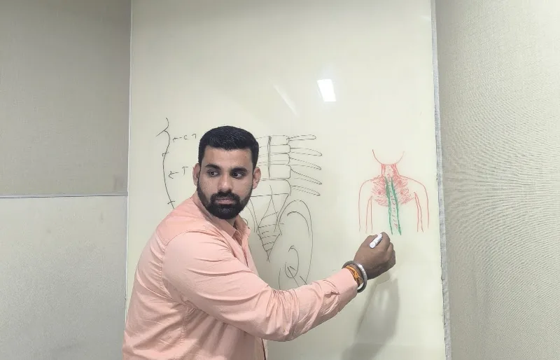 Physiotherapist explaining a treatment plan